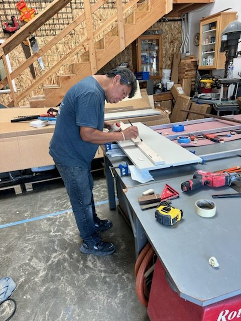 Craftsman building custom cabinetry